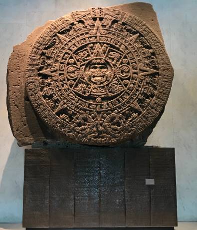 How did the Aztec religion relate to calendars